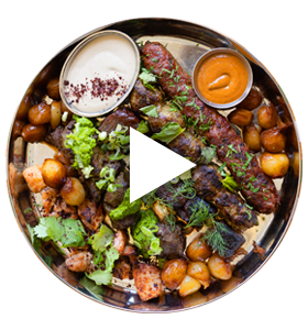picture of a bowl of food with a video play button